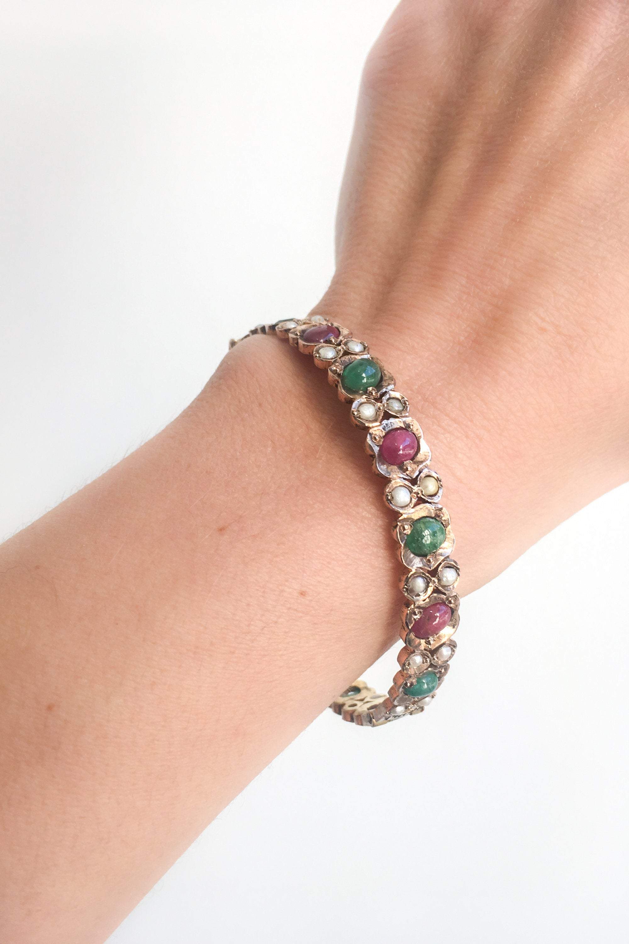 Chain bracelet with sapphire, emerald and ruby cabochon, each with a small  diamond, 585/14K yellow in Germany